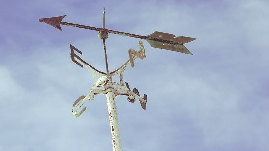 Image of a weather vane showing which way the wind is blowing to symbolise finding direction